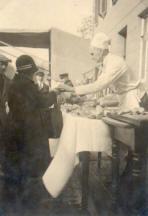 Heimatverein Warendorf: Bäckerstand auf der Münsterstraße 1930
